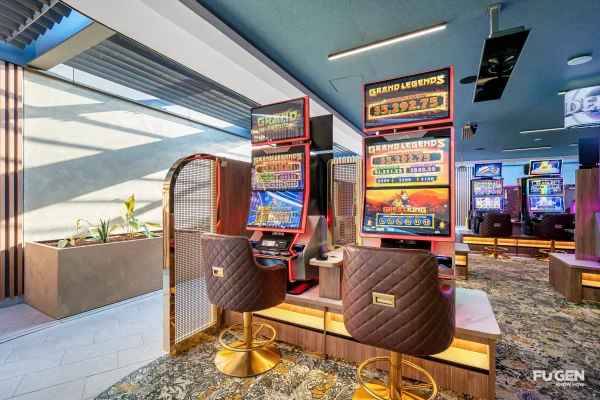inside the gaming room at Worrigee sports club with gaming machines and a skylight area, giving the room a lot of natural light