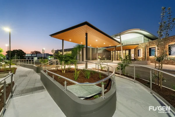different angled shot of the new driveway and port-cochere at the new Worrigee Sports Club refurbishment in the dark with new lighting
